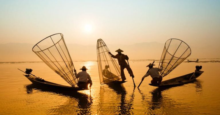 Boat - Three Men Riding Boats on Body of Water