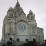 Sanctuaries - A large cathedral with a clock tower on top