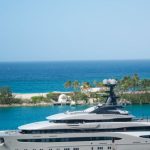 Yacht - White and Blue Yacht on Body of Water