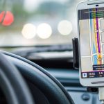 GPS - White Android Smartphone Inside Vehicle