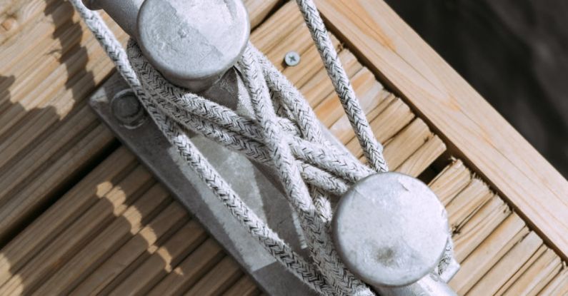 Rigging - Gray Rope on Brown Wooden Surface