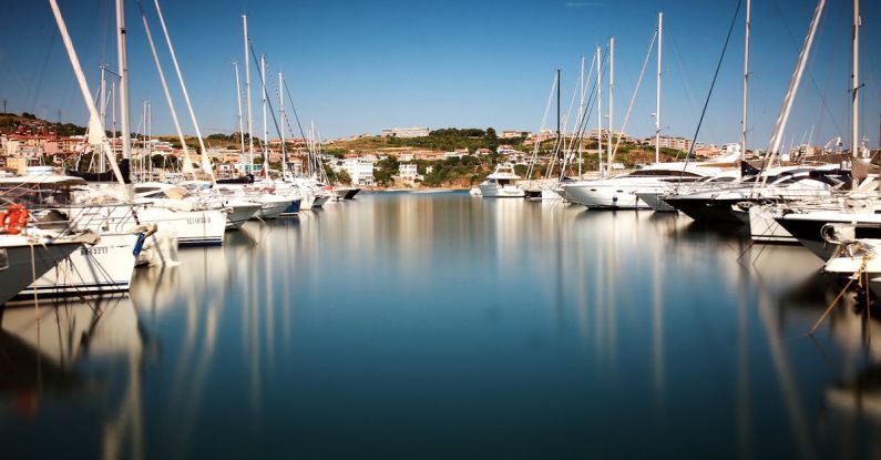 Marina - White Cabin Cruiser on Water