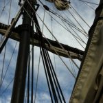 Regattas - Low-angle Photography of Rolled Up Sails on Ship Under Cloudy Sky