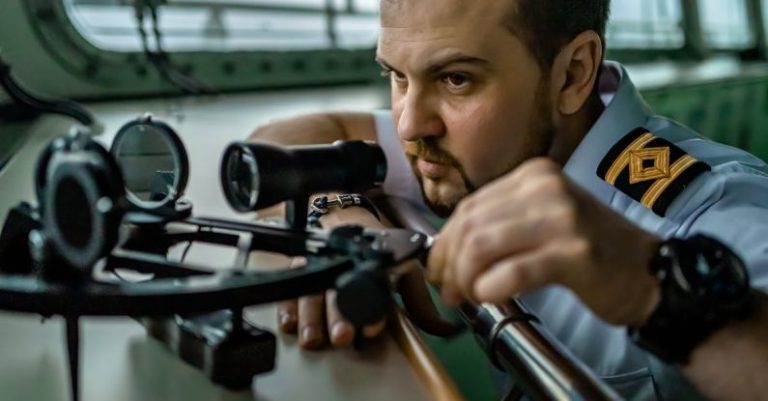 Sextant - Ships Second Officer Looking at the Sextant