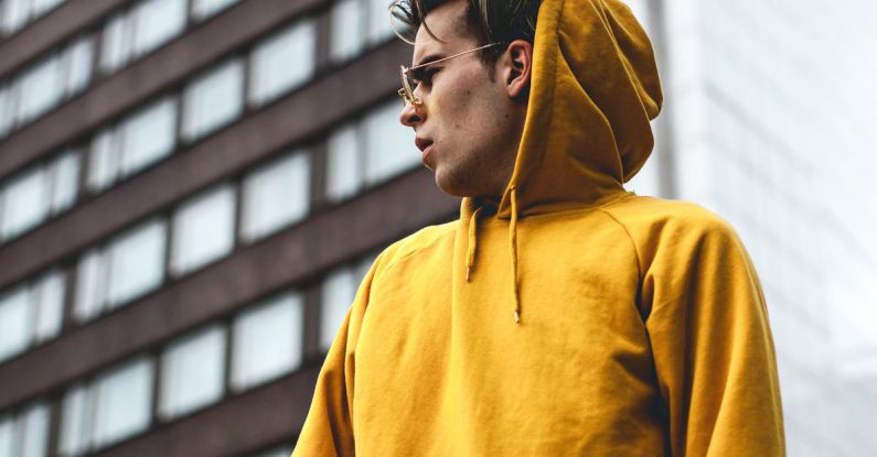 Jackets - Photography of Guy Wearing Yellow Hoodie
