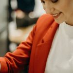 Check - Woman Wearing Red Blazer