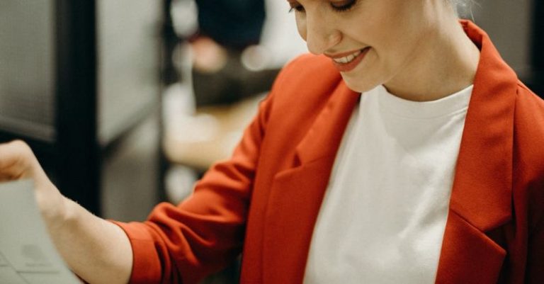 Check - Woman Wearing Red Blazer