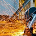 Equipment - Cut-off Saw Cutting Metal With Sparks